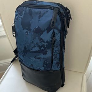 Tumi crossbody backpack